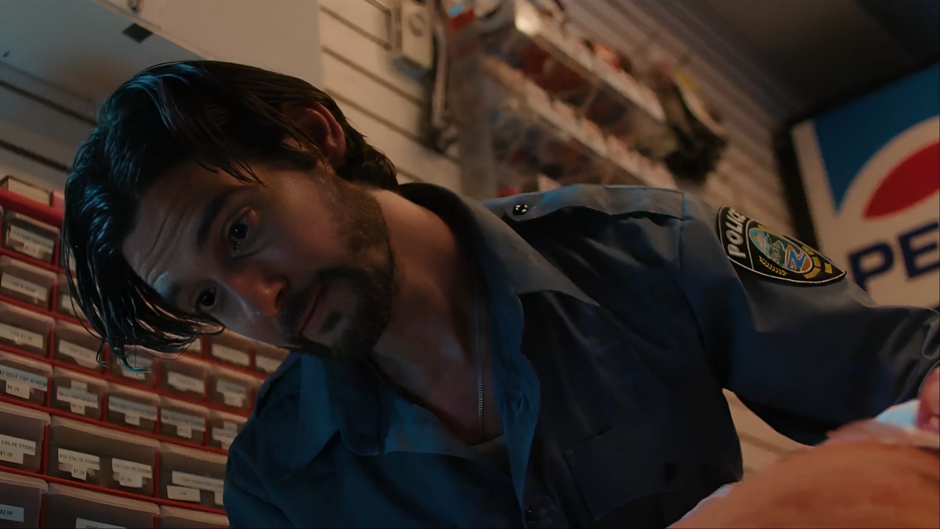 Tim Jamieson responds to a shopkeeper shooting while on night knocker duty in The Institute season 1 (Image via MGM)